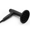 Secador de pelo Corioliss Whisper, motor digital silencioso para resultados profesionales.