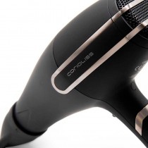 Secador profesional Corioliss ARC, potente motor 2400W y emisión de iones para un acabado perfecto.