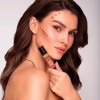 bronceador líquido Eveline con vitamina E, mica y glicerina hidratante